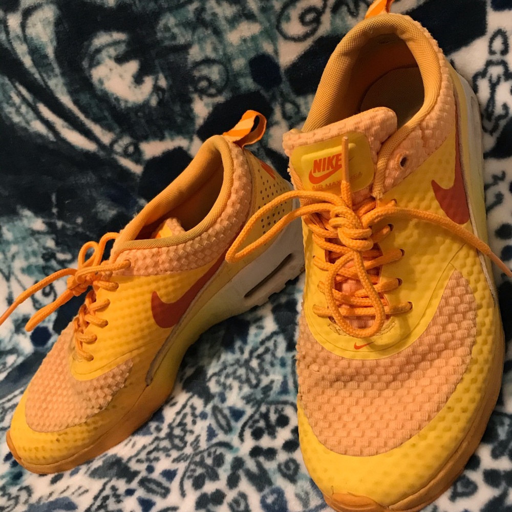 USED LIGHTLY yellow/orange nike tennis shoes